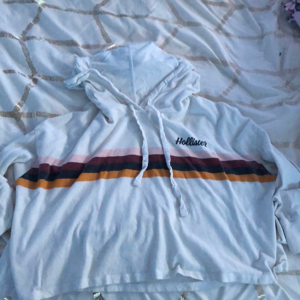 white cropped long sleeve shirt with a hood